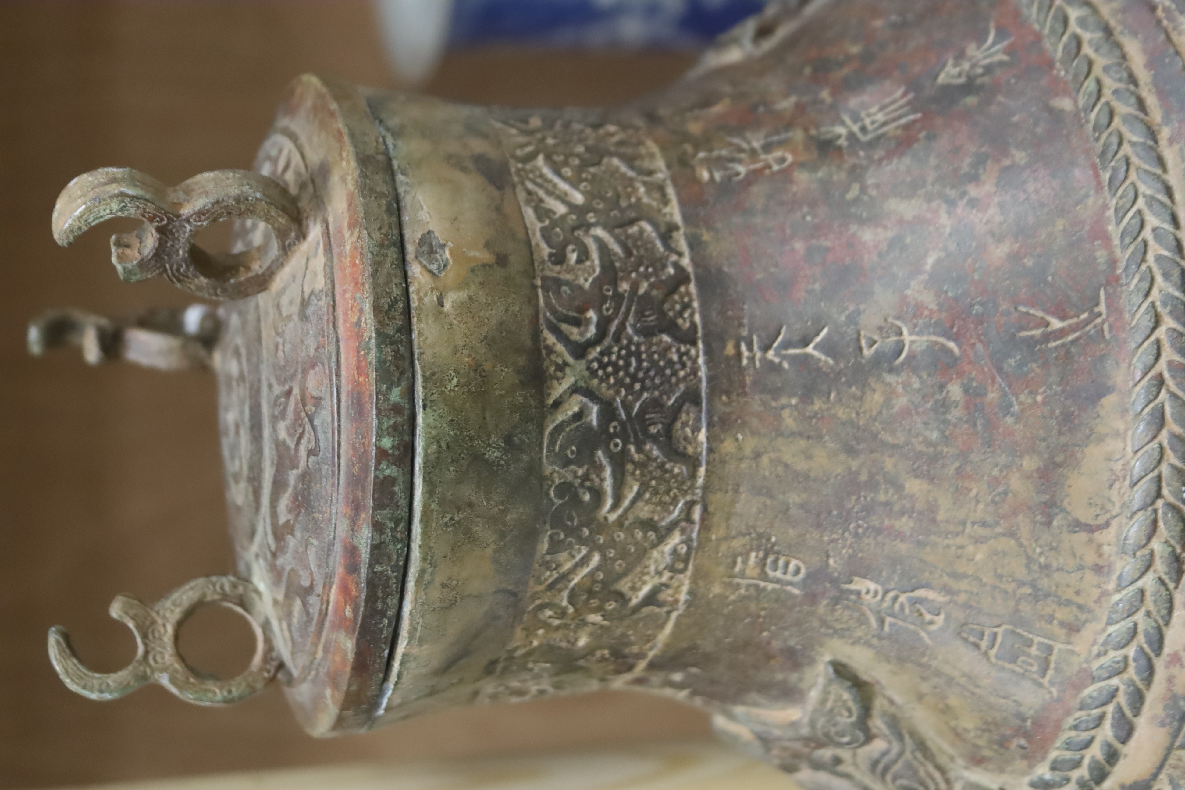 A Chinese cast bronze jar and cover, height 40cm